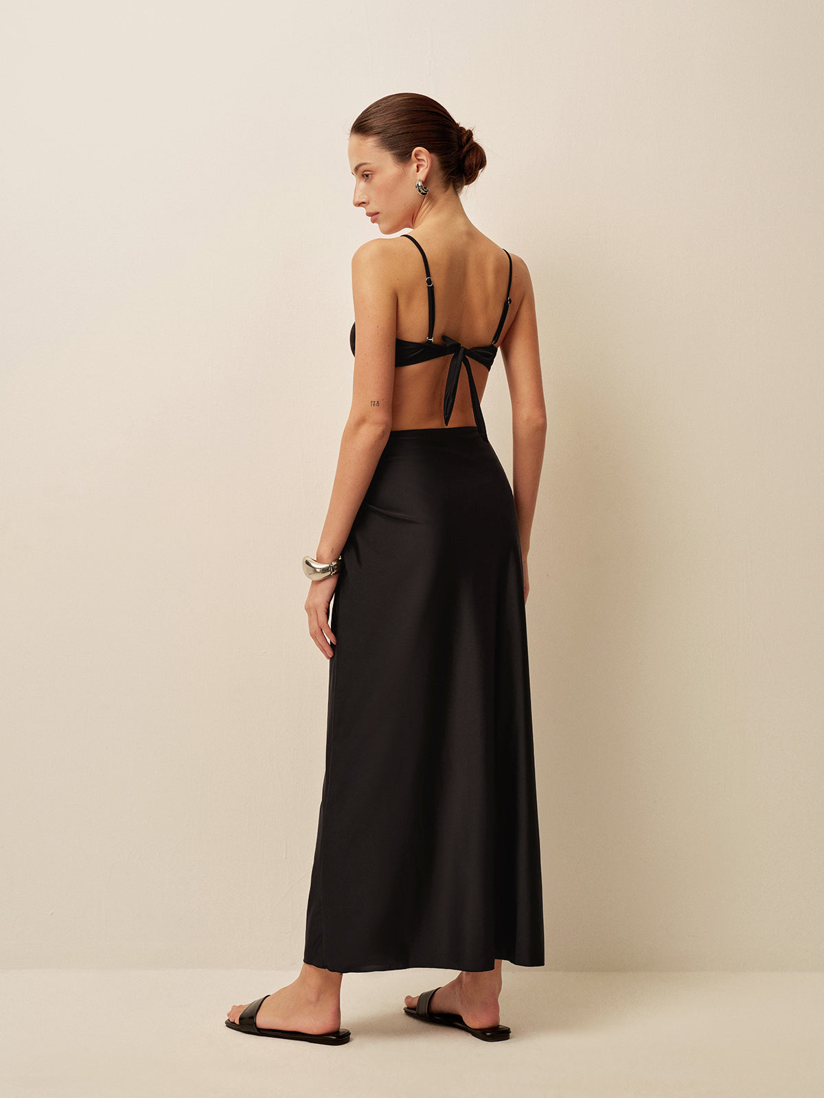 Black silk maxi dress with gold embellishments back view
