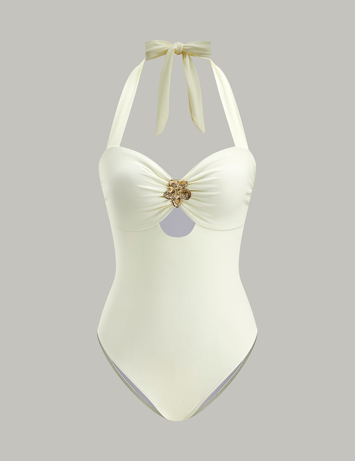 White one-piece swimsuit with gold detail studio front view