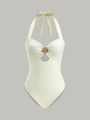 White one-piece swimsuit with gold detail studio front view