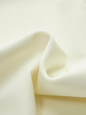 White one-piece swimsuit fabric texture close-up