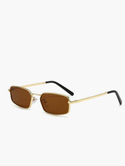 Gold rectangular metal sunglasses with black temples, angled view
