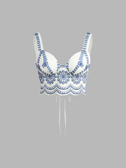 Top white with blue floral embroidery front view