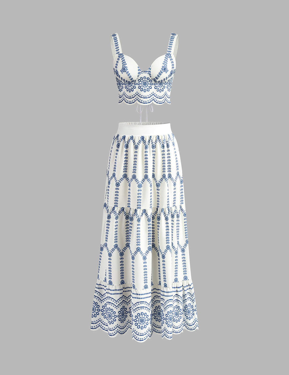 Two-piece set white with blue embroidery front view