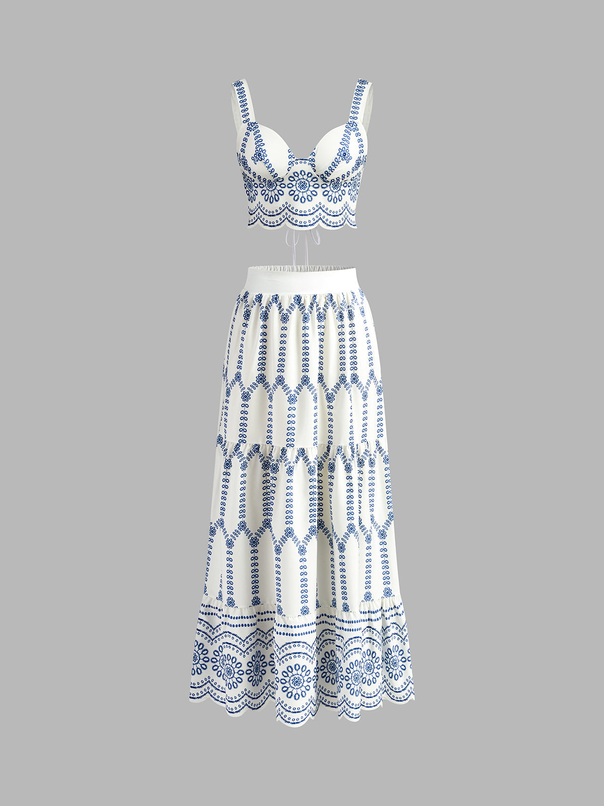 Two-piece set white with blue embroidery front view
