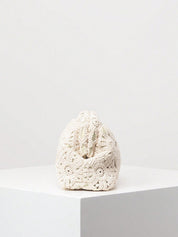 Crochet clutch bag white side view