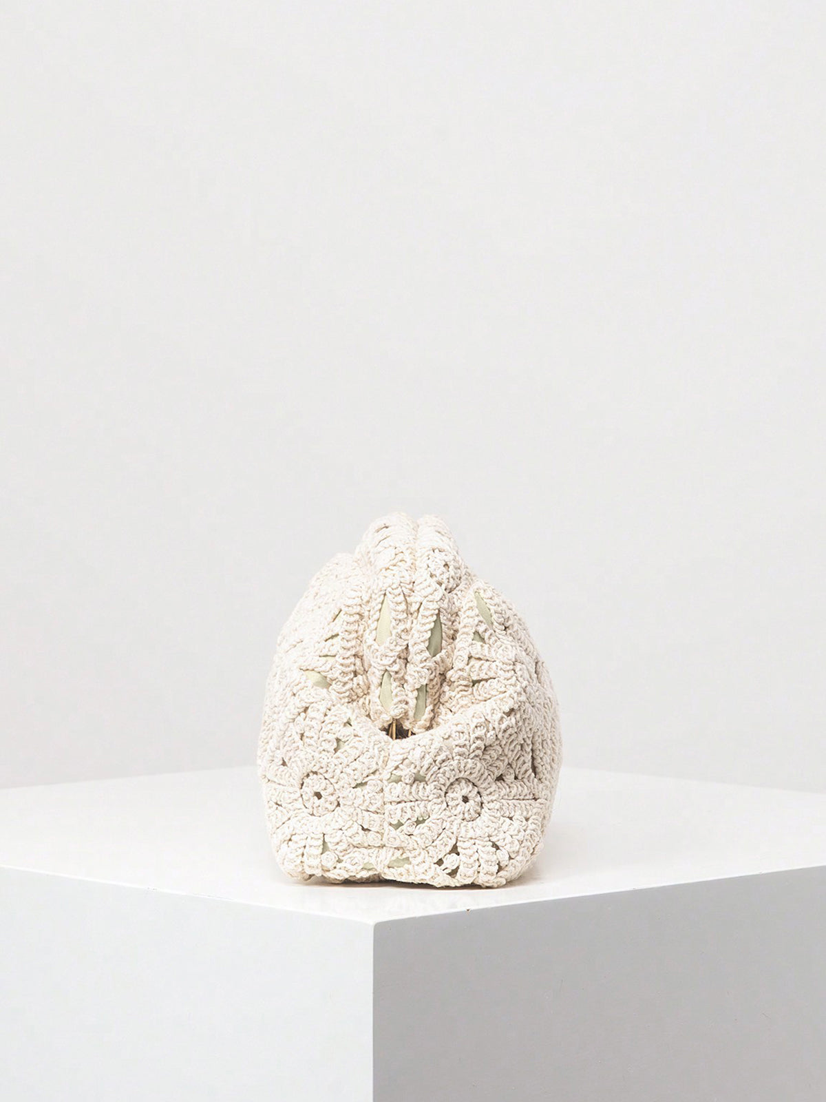 Crochet clutch bag white side view