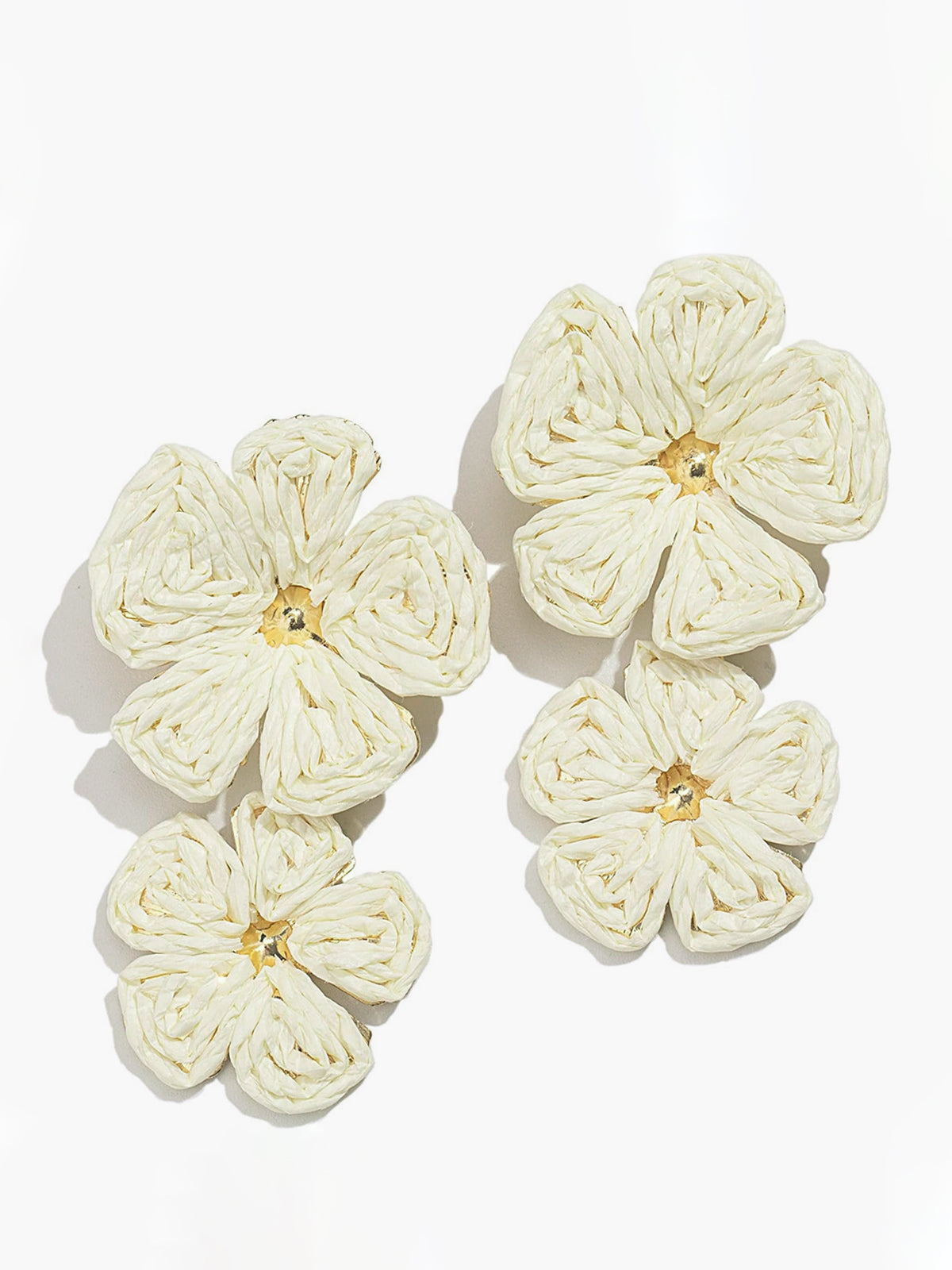 White woven raffia double flower drop earrings angled view