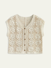 Cream crochet vest with floral pattern isolated view
