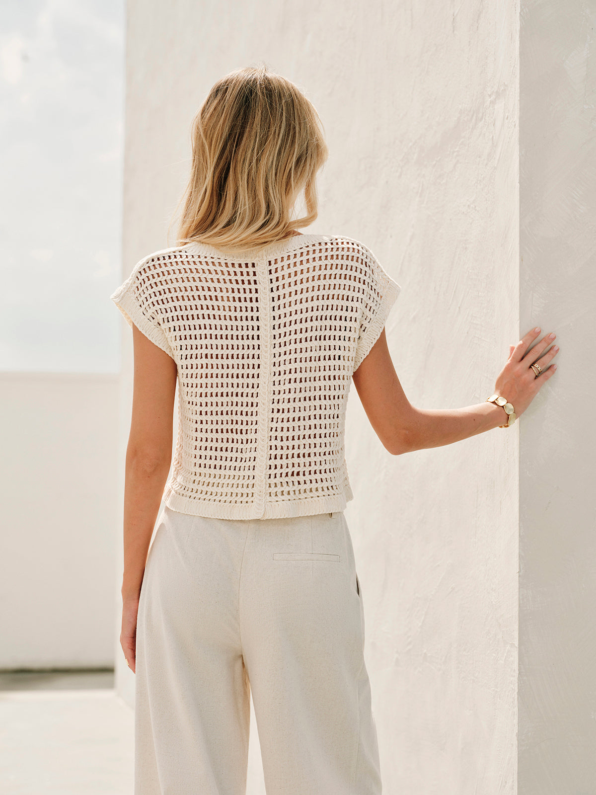 Cream crochet vest with floral pattern back view