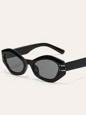 Sunglasses black geometric frame with gold accents angled view
