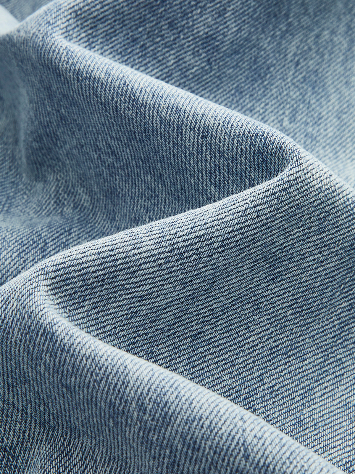 Broek denim lichtblauw detailtextuur