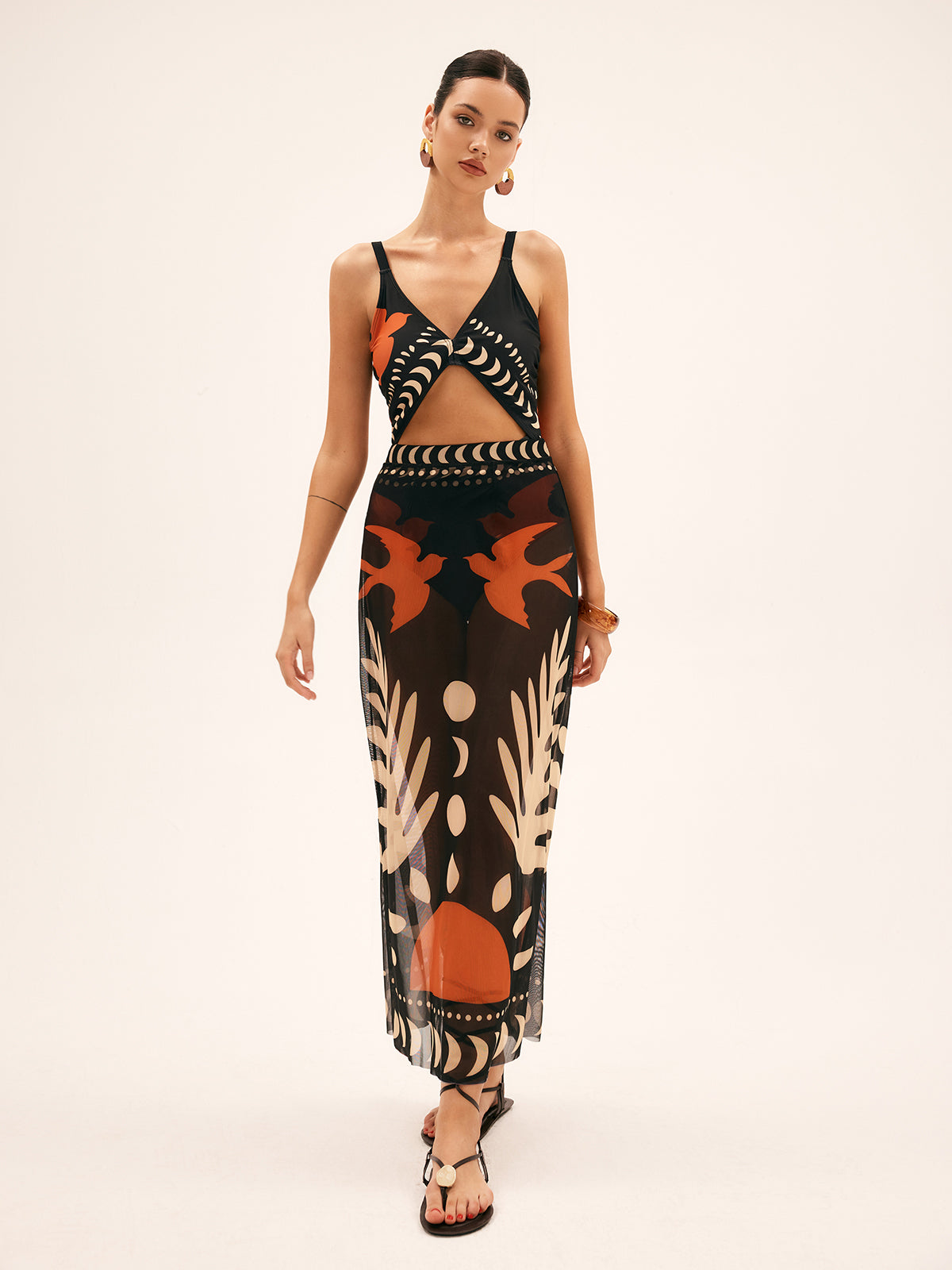 Maxi dress with cutouts and tropical print three-quarter view