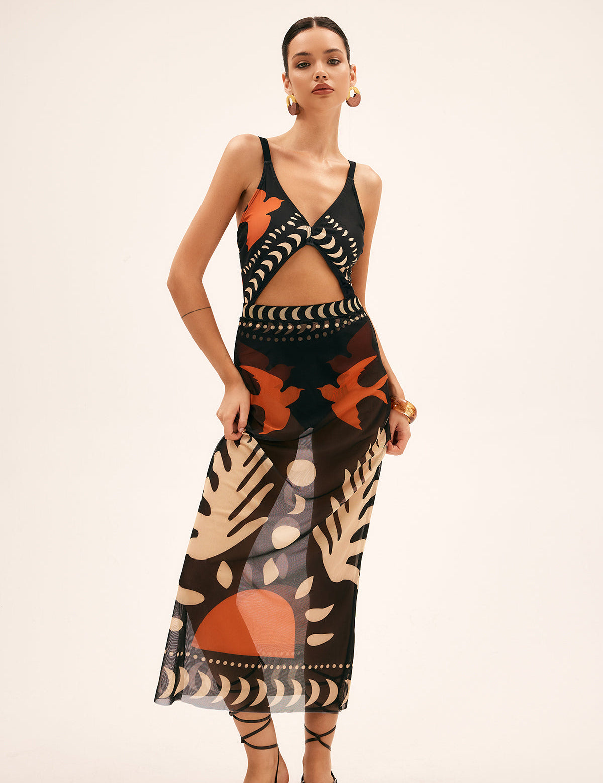 Maxi dress with cutouts and tropical print front view