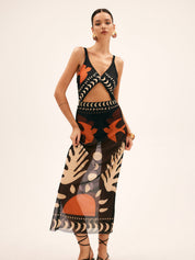 Maxi dress with cutouts and tropical print front view