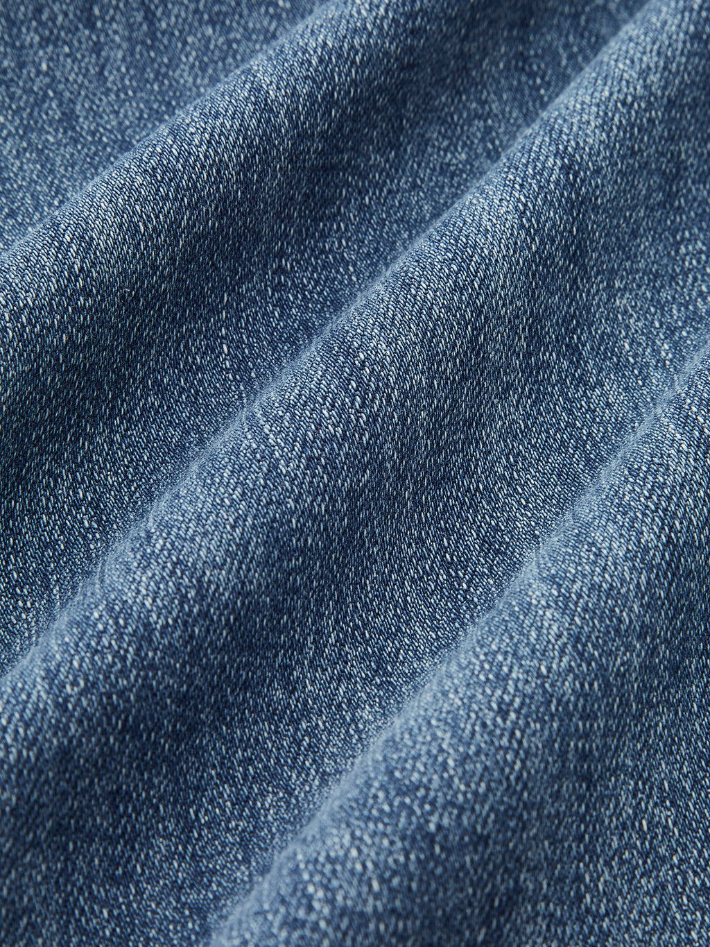 Blauwe jeans stofdetail met stretch textuur