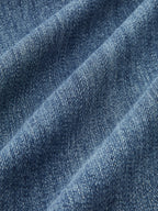 Blauwe jeans stofdetail met stretch textuur