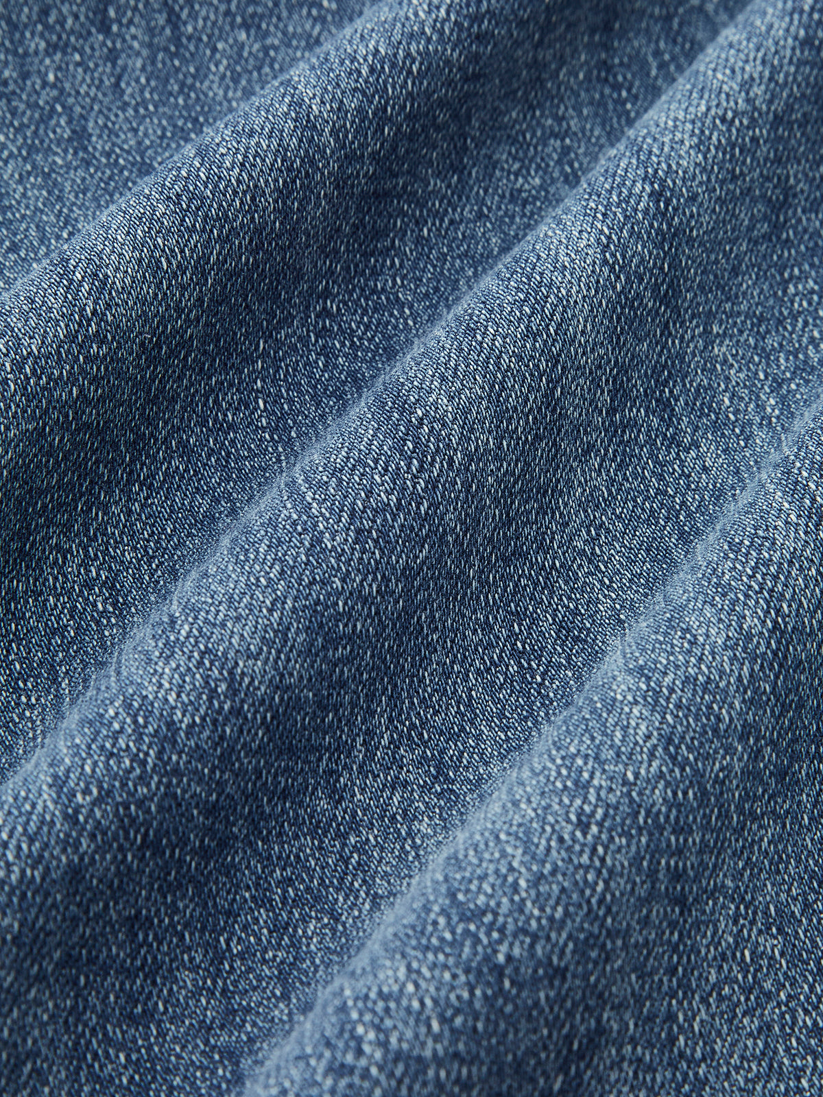Blauwe jeans stofdetail met stretch textuur
