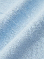 Close-up of light blue linen co-ord set fabric texture