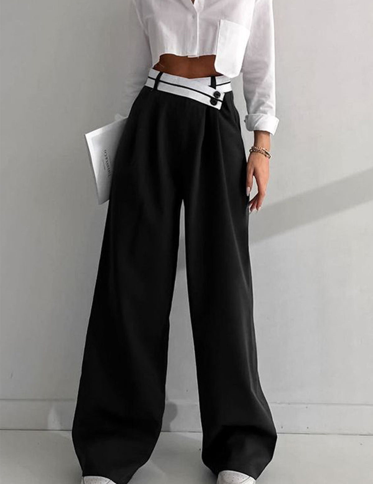 Wide-leg black pants with white contrast waistband front view
