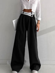 Wide-leg black pants with white contrast waistband front view