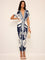 Dress with deep V-neck and tropical print, front view