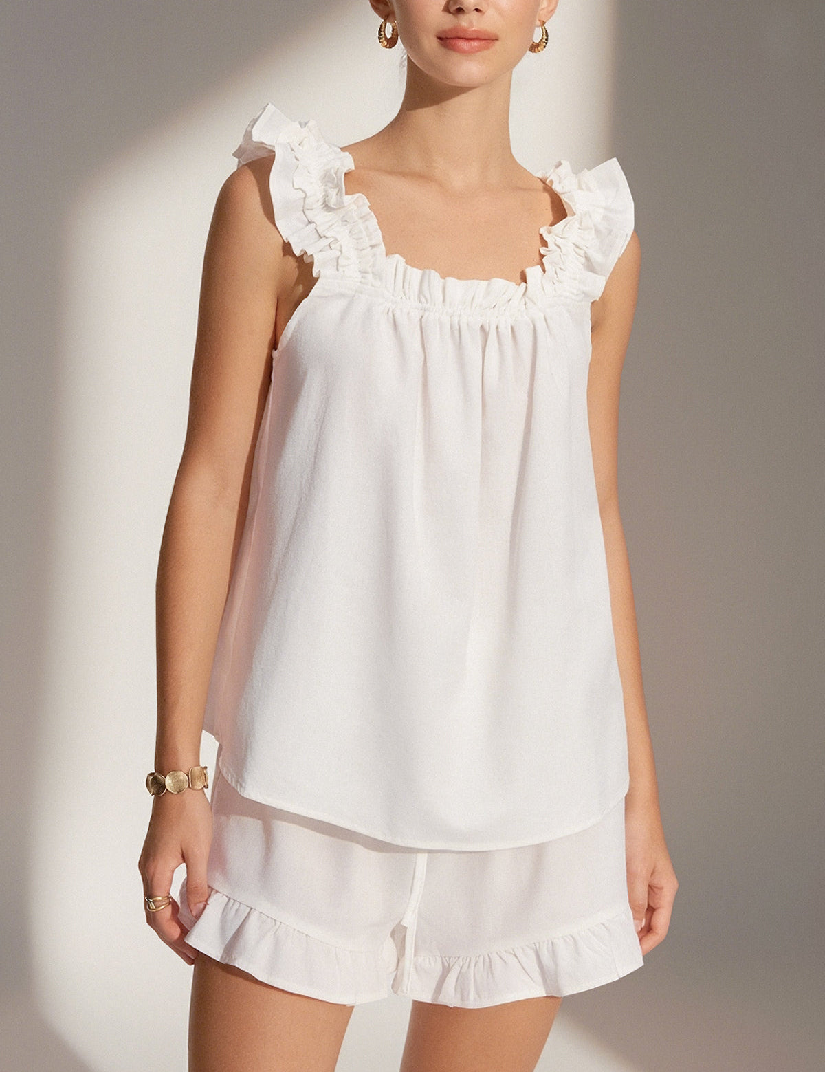 White loungewear set with ruffle details front view