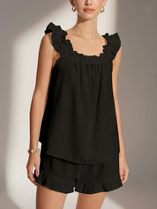 Black loungewear set with ruffle details front view