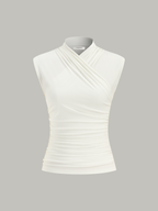 White sleeveless top with ruched detail isolated front view