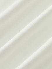 Close-up of white sleeveless top fabric texture