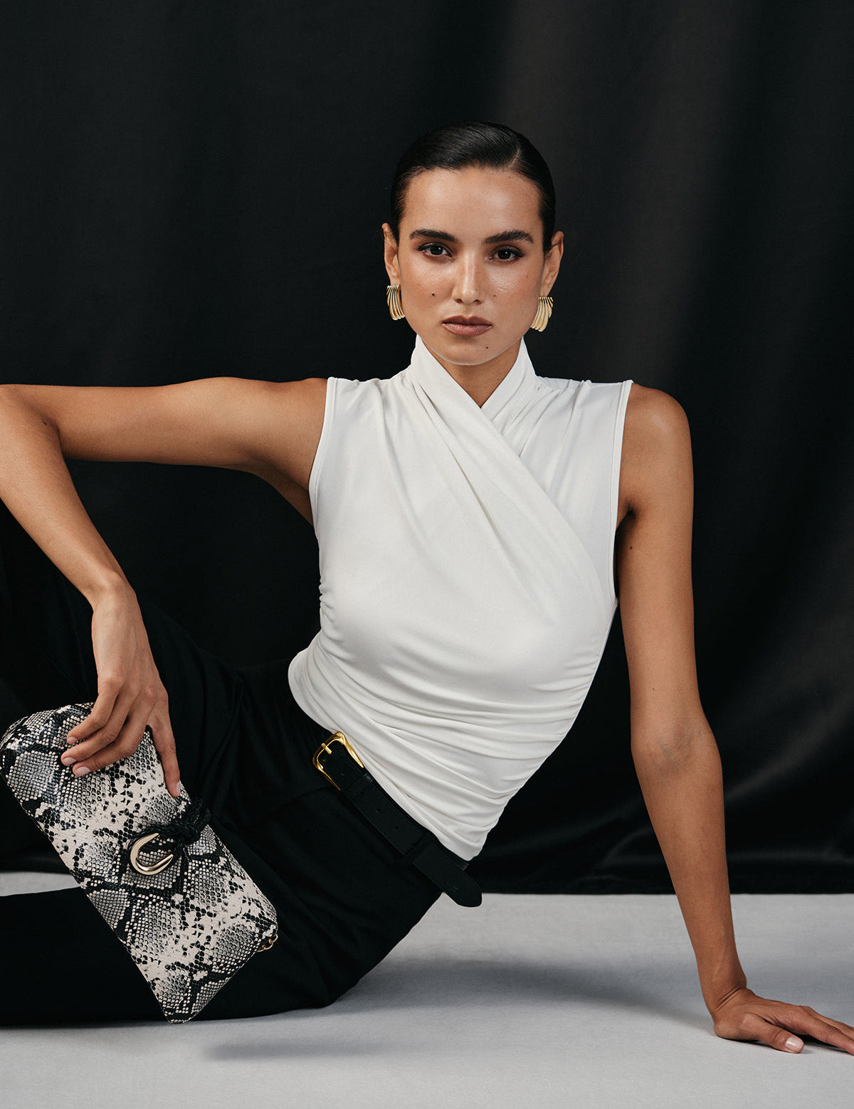 White sleeveless top with ruched detail front view