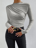Gray top with ruched draping front view