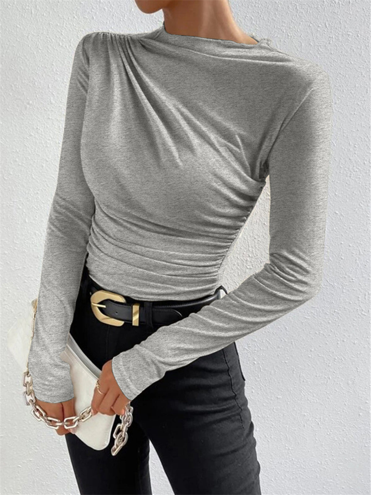 Gray top with ruched draping three-quarter view