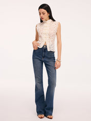 Cream lace blouse with pearl buttons side profile