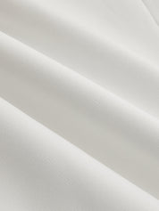 White V-neck top fabric texture, close-up