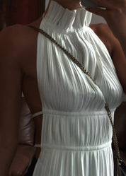 White pleated halter top with chain detail close-up back view