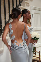 Maxi dress light blue back view with floral lace and staircase