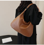 Schoudertas bruin leer detail schouder