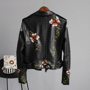 Black leather jacket with floral embroidery and studs, back view