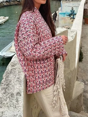 Women's jacket with red and white pattern, side view