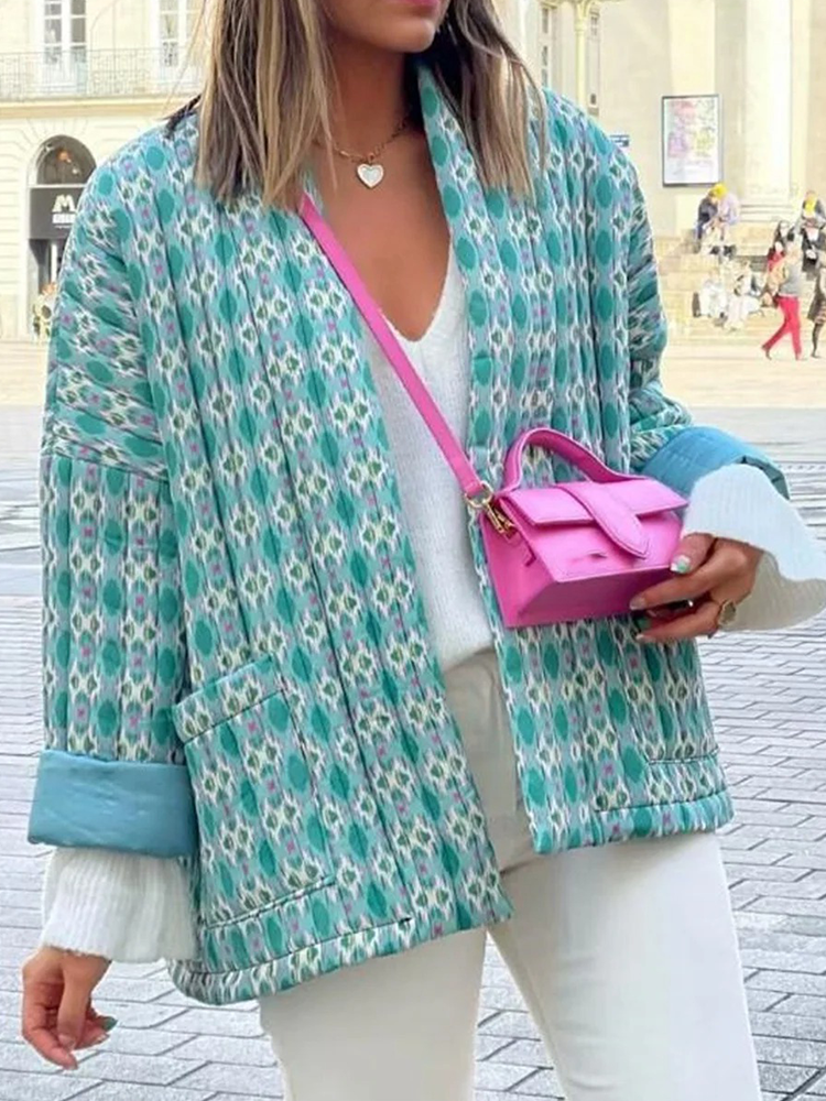 Women's jacket with green and white pattern, side view