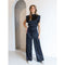 Jumpsuit zwart fluweel met ruches rugzijde