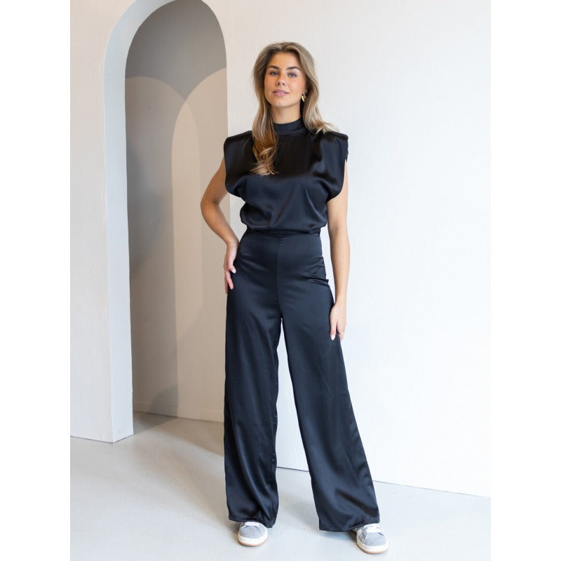 Jumpsuit zwart fluweel met ruches rugzijde