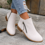 Witte suede laarzen met hak en rits vooraanzicht