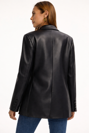 Women's black faux leather blazer back view