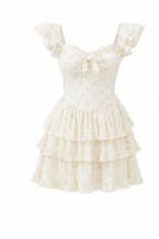 Mini dress with ruffles and floral print studio shot