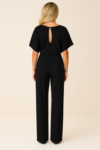 Jumpsuit zwart met open rug en korte mouwen achterzijde