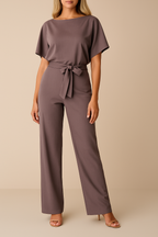 Jumpsuit donkerroze met riem en vallende mouwen front view