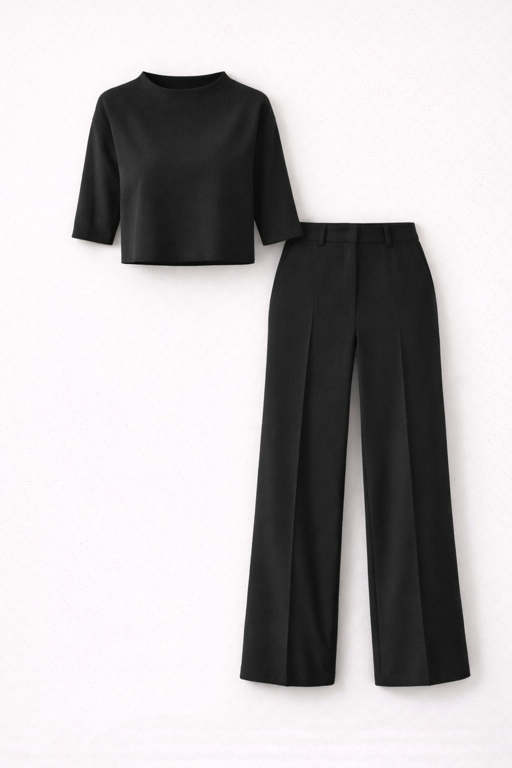 Black pantsuit set with crop top and wide legs, flat lay view