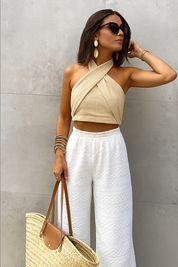 Beige halter crop top crisscross design front view