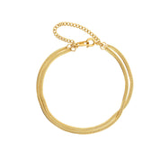 Gold-colored snake chain bracelet with extender, front view